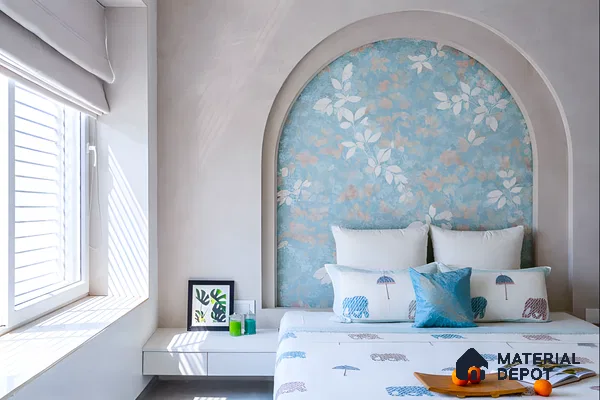 Scandinavian bedroom with blue floral wallpaper accent and white matte finishes