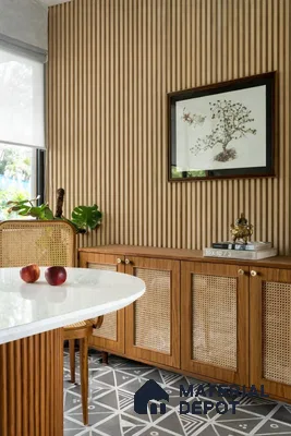 Mid-century modern dining room with cane cabinet, fluted wood panels, and geometric grey floor tiles