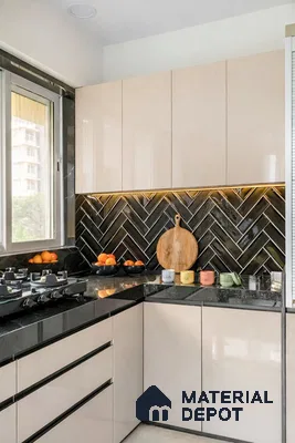 Modern kitchen with beige high gloss laminate cabinets, black quartz countertop, and black herringbone subway backsplash tile