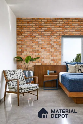 Mid-century modern bedroom with exposed brick wall, walnut wood furniture, and glossy beige floor tile in 3 BHK apartment Hilife Triflora Gunjur Road Bengaluru
