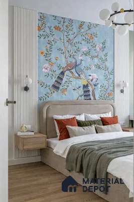 Japandi bedroom with chinoiserie wallpaper, suede upholstered bed, and wood flooring