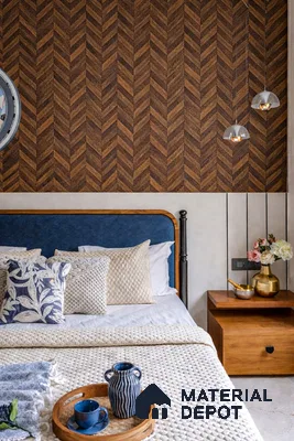 Mid-century modern bedroom with chevron wood panel accent wall and blue upholstered bed