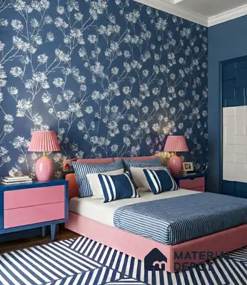 Eclectic bedroom with blue floral wallpaper, pink upholstered bed, and striped blue-and-white rug of 3 BHK apartment in IBC Platinum City Yeshwanthpur Bengaluru