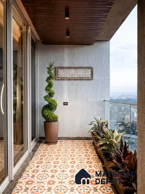 Mediterranean balcony with patterned terracotta and grey floor tiles and wooden ceiling panels