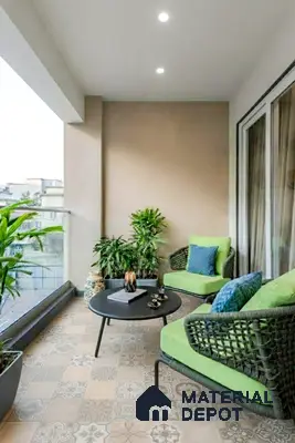 Modern balcony with patterned beige and grey floor tiles and green wicker seating in 2 BHK apartment JS Sunflower Anantapuram Bengaluru