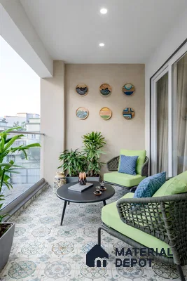 Modern balcony with patterned moroccan floor tiles and woven outdoor seating