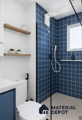 Modern bathroom with blue square wall tiles, white wall tiles, and minimalist floating shelves