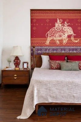 Traditional bedroom with Indian motif wallpaper, solid wood bed, and walnut wooden flooring