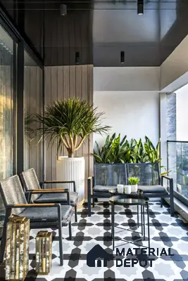 Modern balcony with geometric black-and-white patterned floor tiles and wood wall panels of 4 BHK apartment in Jain Heights East Parade Kaggadasapura Bengaluru