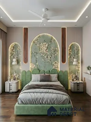 Modern bedroom with green suede upholstered bed, floral wallpaper accent wall, and wooden flooring in 3 BHK apartment Jal Vayu Heights Peenya Phase 1 Bengaluru
