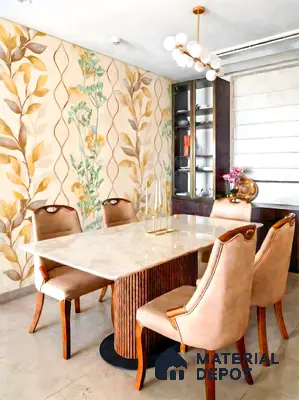 Modern dining room with floral wallpaper, marble dining table, and beige upholstered chairs in 3 BHK apartment Jal Vayu Heights Peenya Phase 1 Bengaluru