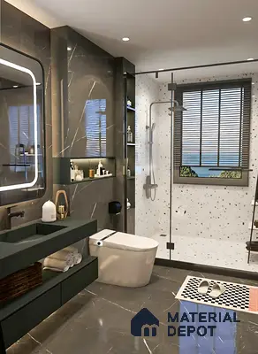 Modern bathroom with dark marble wall tiles, terrazzo shower tiles, and matte black vanity of 3 BHK apartment in Jana Jeeva orchid KR puram Bengaluru