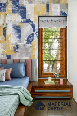 Eclectic bedroom with abstract geometric wallpaper, pastel upholstered headboard, and walnut wood nightstand
