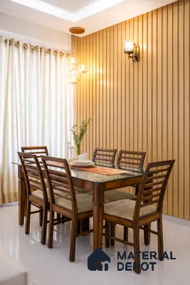 Modern dining room with light wood fluted wall panels and glass-top wooden dining table
