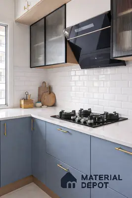 Modern kitchen with pastel blue laminate, white quartz countertop, and white subway backsplash tiles