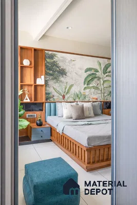 Scandinavian bedroom with natural wood bed, tropical wallpaper, and blue upholstered accents