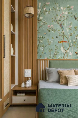Japandi bedroom with natural wood laminate, green chinoiserie wallpaper, and woven cane accents