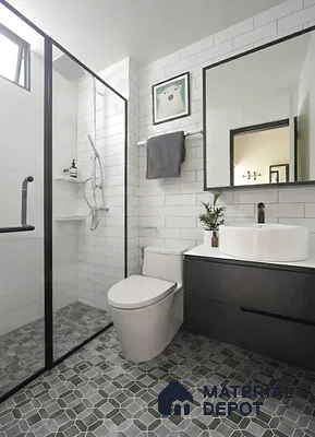 Modern bathroom with white subway wall tiles and grey geometric hexagonal floor tiles