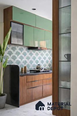 Modern kitchen with sage green high gloss laminate, walnut wood laminate, and floral patterned backsplash tile