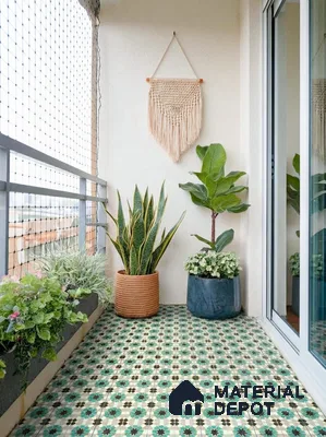 Bohemian balcony with green and cream moroccan patterned floor tiles and macrame wall decor