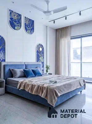 Modern bedroom with blue chinoiserie wallpaper panels and terrazzo floor tiles