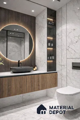 Modern bathroom with white marble tiles, fluted wood vanity, and backlit round mirror