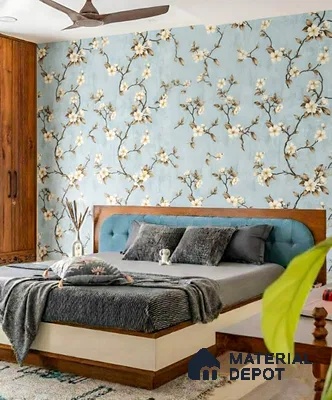 Modern bedroom with blue floral wallpaper, walnut wood wardrobe, and upholstered bed in LVS Gardenia Hallehalli 3 BHK apartment Bengaluru