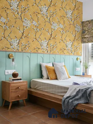 Scandinavian bedroom with yellow floral wallpaper, mint green wall panels, and natural wood furniture in 3 BHK apartment LVS Heights KR Puram Bengaluru