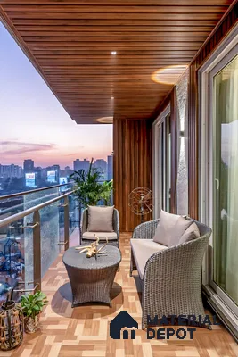 Modern balcony with wooden louver ceiling, parquet wood floor tiles, and rattan outdoor furniture