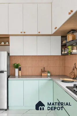 Scandinavian kitchen with pastel green laminate, frosty white laminate, and terracotta fluted backsplash tile