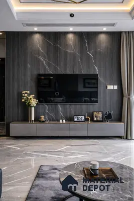 Modern living room with grey marble laminate TV unit, fluted black marble wall, and marble floor tiles