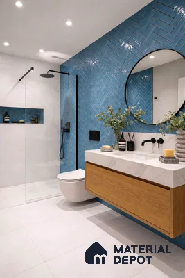 Modern bathroom with blue herringbone subway wall tiles, white marble countertop, and wooden floating vanity