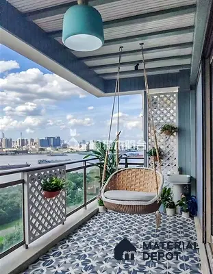 Modern balcony with blue and white geometric patterned floor tiles and wicker swing of 3 BHK apartment in Mahaveer Rich Jalahalli Bengaluru