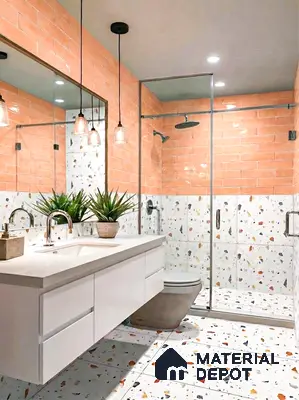 Modern bathroom with peach subway wall tiles and terrazzo floor and wall tiles in 3 BHK apartment Maithri Shilpitha Splendour Mahadevapura Bengaluru