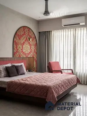 Art Deco bedroom with red and gold damask wallpaper accent, wooden panel headboard, and marble floor tile in 3 BHK apartment Maithri Shilpitha Splendour Mahadevapura Bengaluru