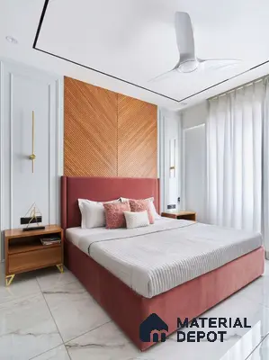 Modern bedroom with blush pink suede upholstered bed, chevron wood panel headboard, and white marble floor tiles in 3 BHK apartment Maithri Shilpitha Splendour Mahadevapura Bengaluru