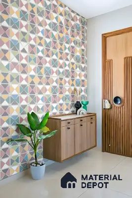 Modern foyer with geometric pastel patterned wall tiles and light oak wood laminate console of 3 BHK apartment in Mantri Webcity Hennur Road in Bengaluru