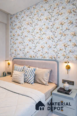 Modern bedroom with blue floral wallpaper and suede upholstered bed