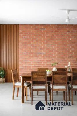 Scandinavian dining room with exposed brick wall, wooden louver panel, and solid wood dining set