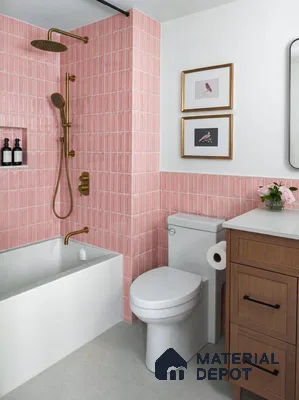 Modern bathroom with blush pink geometric wall tiles, white bathtub, and wood vanity in 2 BHK apartment NCN Gold Kalyan Nagar Bengaluru