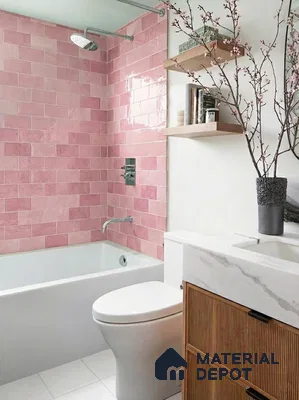 Scandinavian bathroom with pink subway wall tiles, white marble countertop, and fluted wood vanity