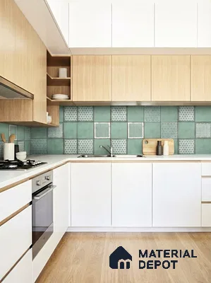 Scandinavian kitchen with white laminate cabinets, light oak wood laminate, and green patterned backsplash tiles