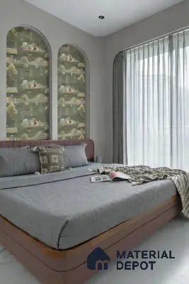 Minimalist bedroom with nature-themed patterned wallpaper and grey suede upholstery