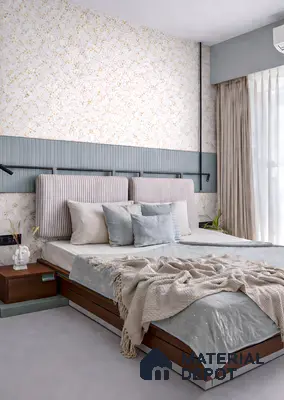 Scandinavian bedroom with terrazzo look wallpaper, ribbed upholstered headboard, and pastel blue wall panel