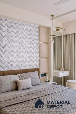 Modern bedroom with chevron patterned wallpaper, beige suede headboard, and neutral palette