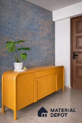 Modern foyer with ochre laminate console and blue textured wall finish
