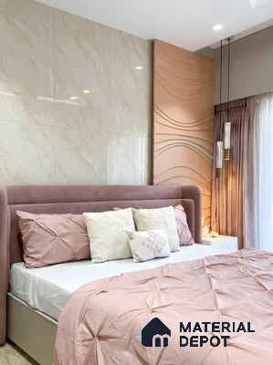 Modern bedroom with blush pink suede upholstered bed, marble wall panels, and peach wave-textured accent panel