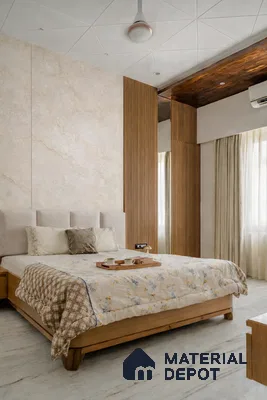 Modern bedroom with beige marble wall panels, wooden louvers, and light marble floor tiles