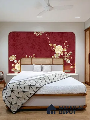 Modern bedroom with floral wallpaper accent wall, cane headboard, and wooden flooring