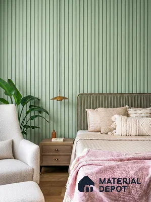 Japandi bedroom with sage green fluted wall panels and natural wood flooring